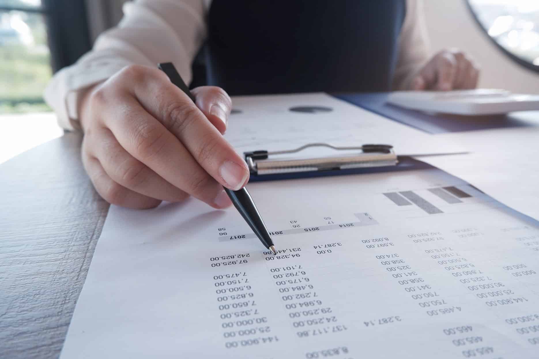 Accountant adjusting VAT records for bad debt relief in the UAE.