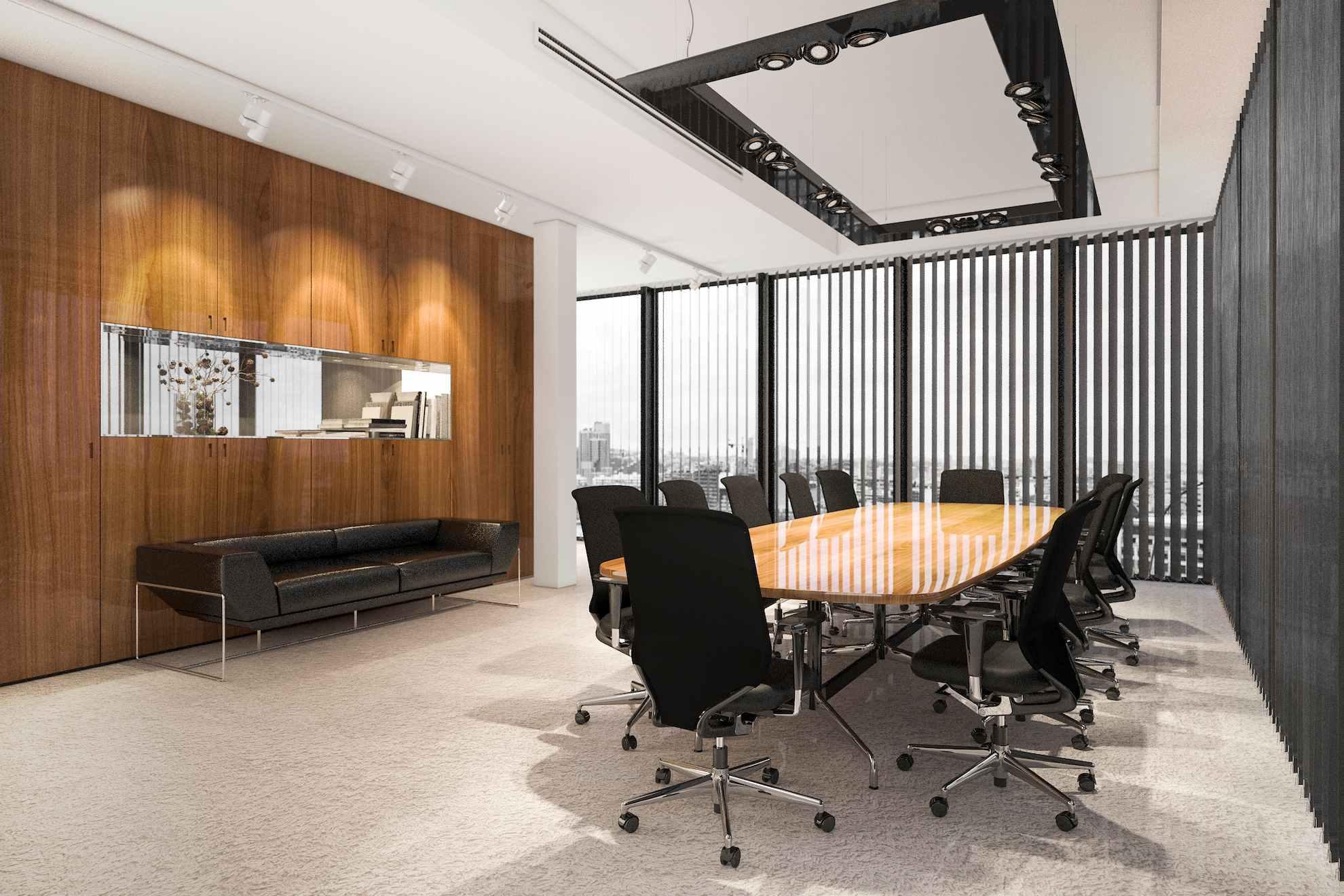 Modern UAE boardroom with wooden table and city view, symbolizing corporate governance decisions and Articles of Association compliance.