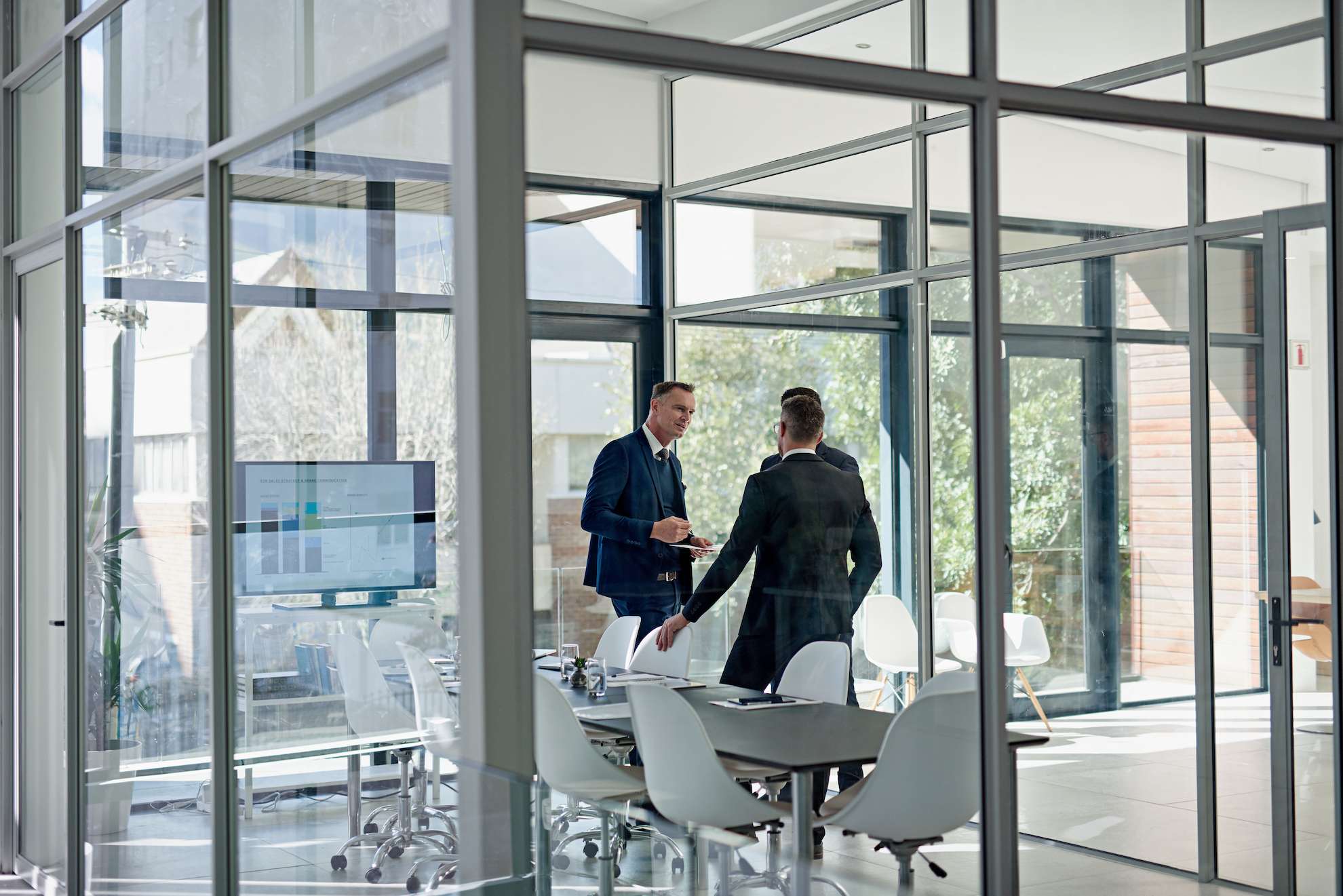 Business consultation in Dubai office discussing taxes in Dubai compliance.