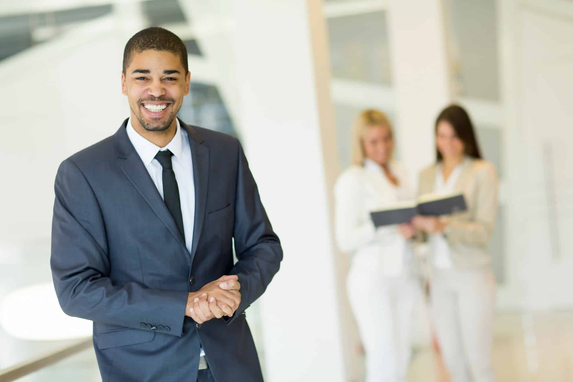 TaxReady.ae tax agents posing for a team photo in their office.