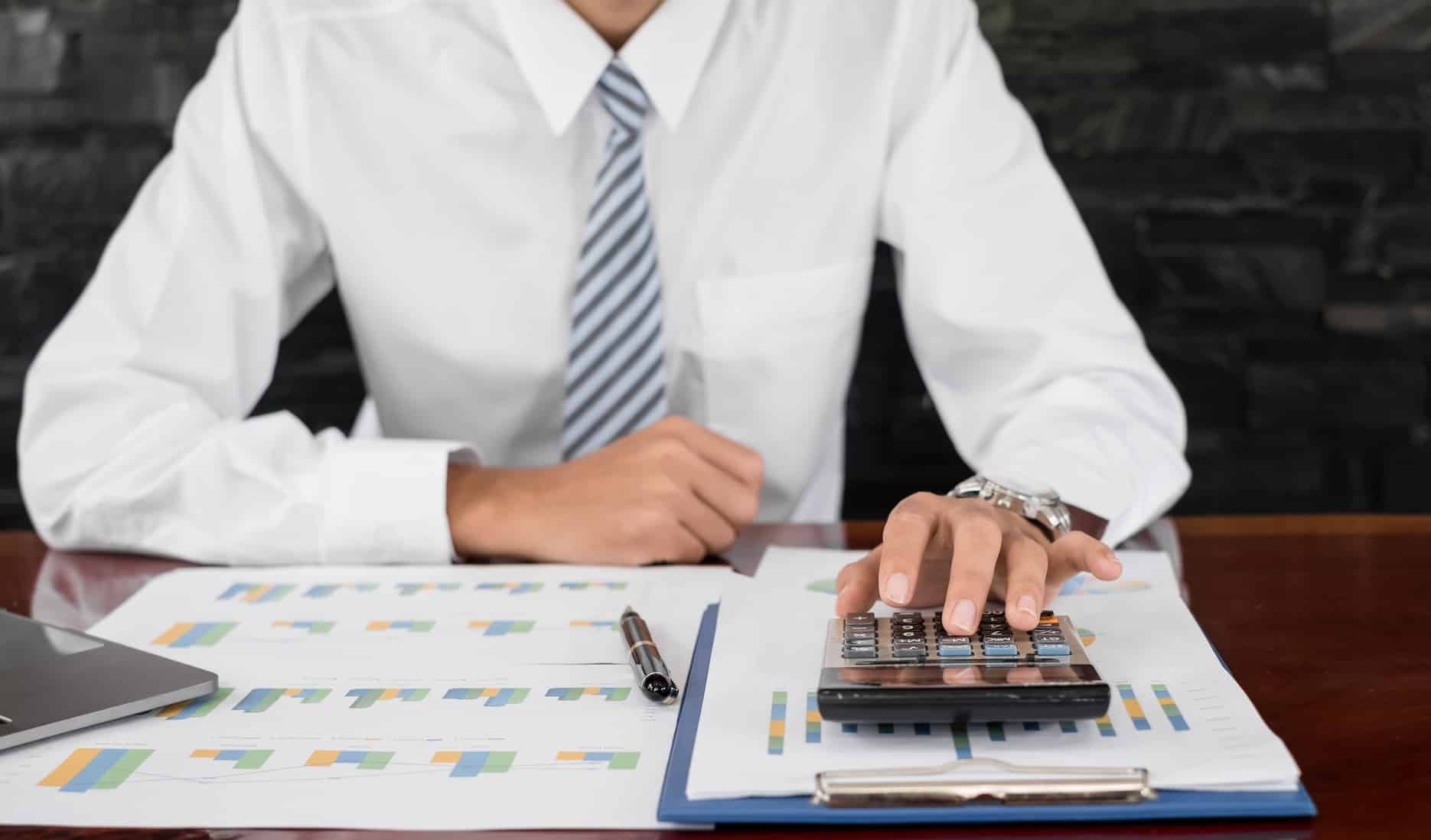 An accountant completing a monthly reconciliation of accounts. 
